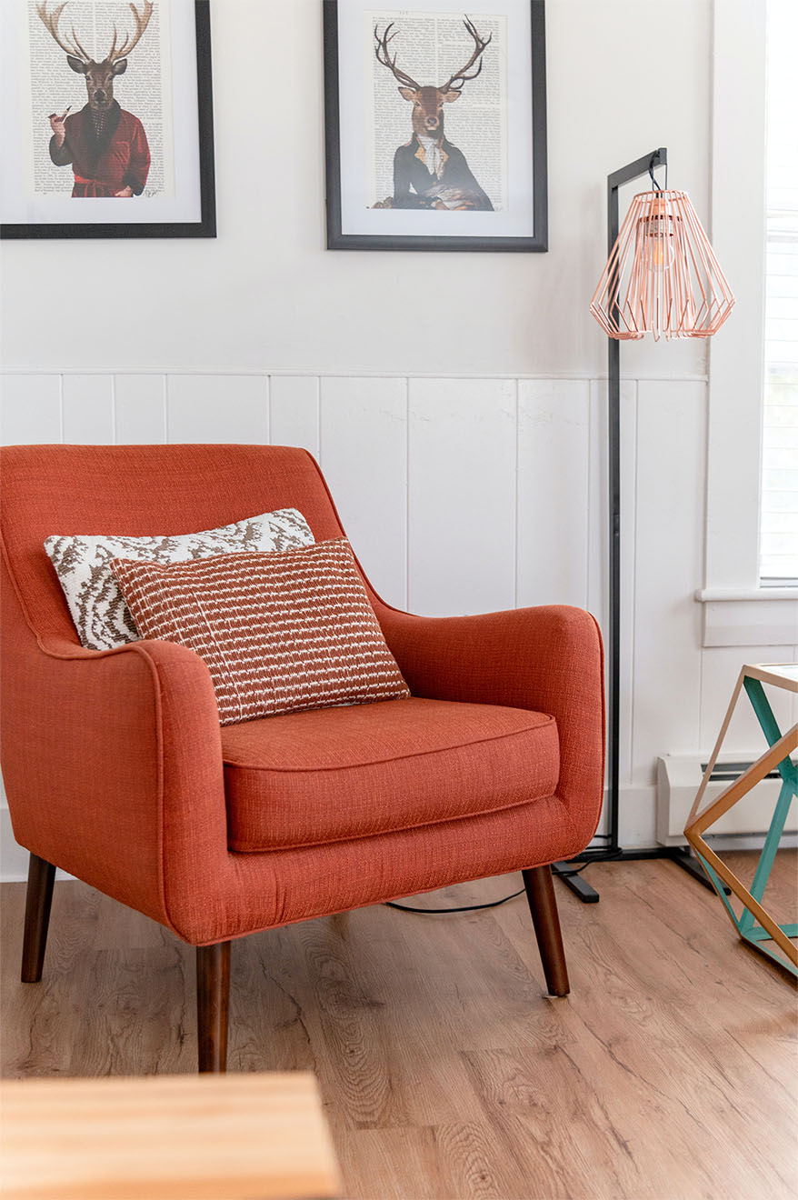 red armchair and cushions