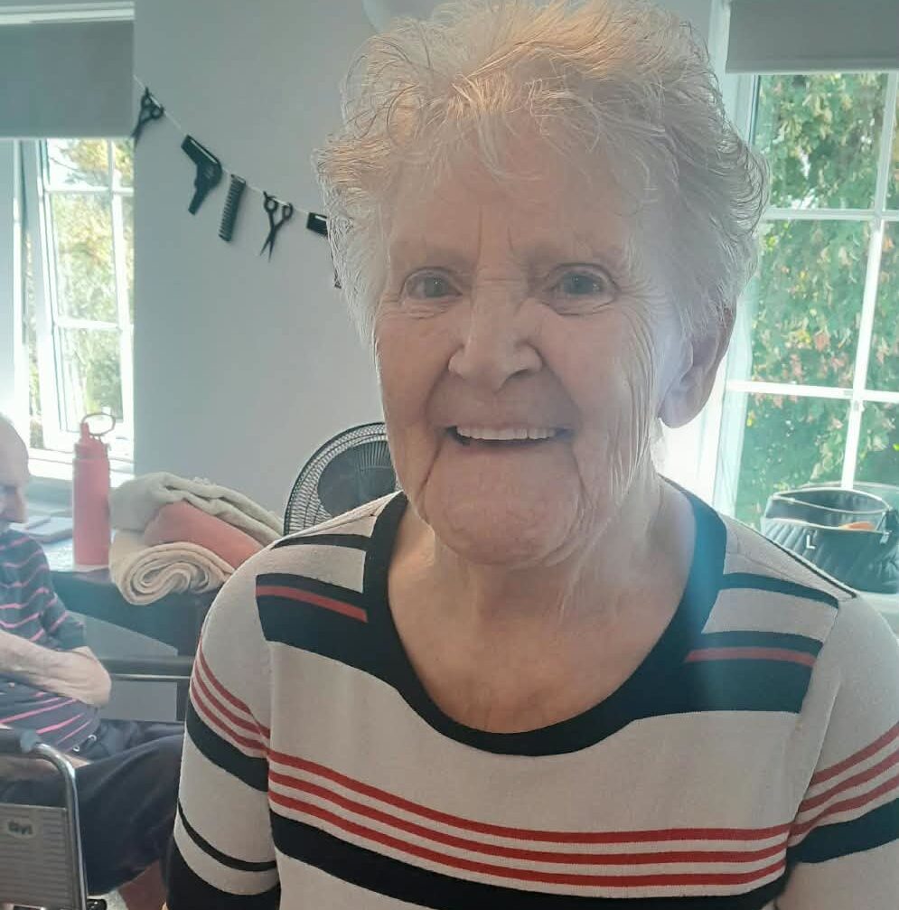 an older lady smiling